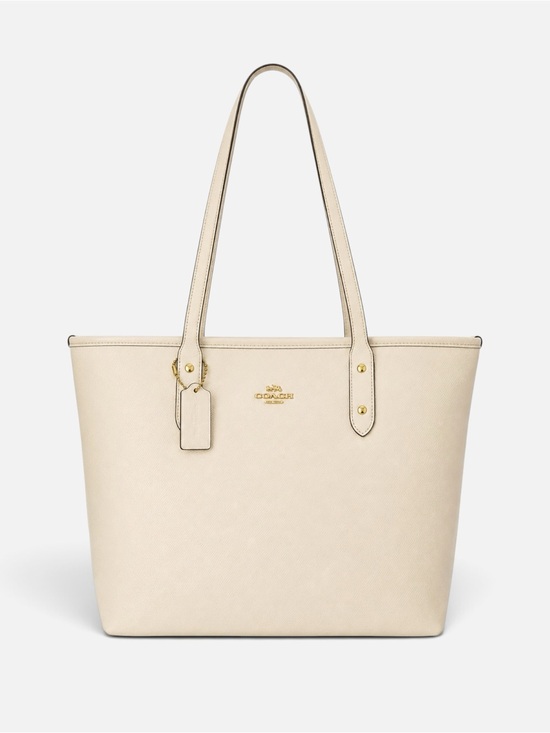 Coach Handbags - Coach Ivory Leather Tote with Yellow Charm
